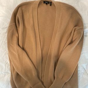 Camel colored Theory sweater.